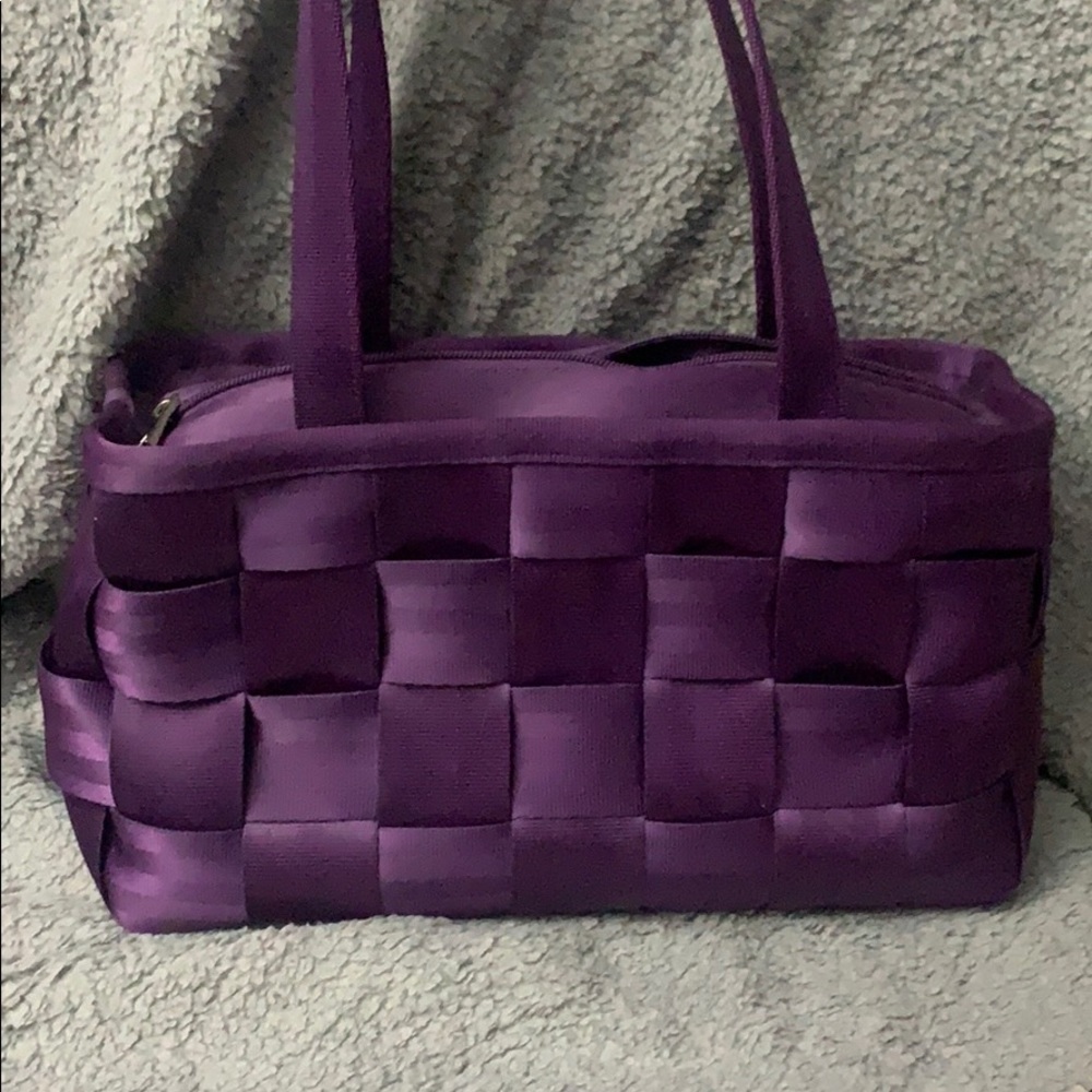 Harvey’s mini purple seatbelt bag